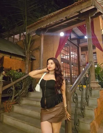 Fiya, a cute college girl escort offering youthful romance